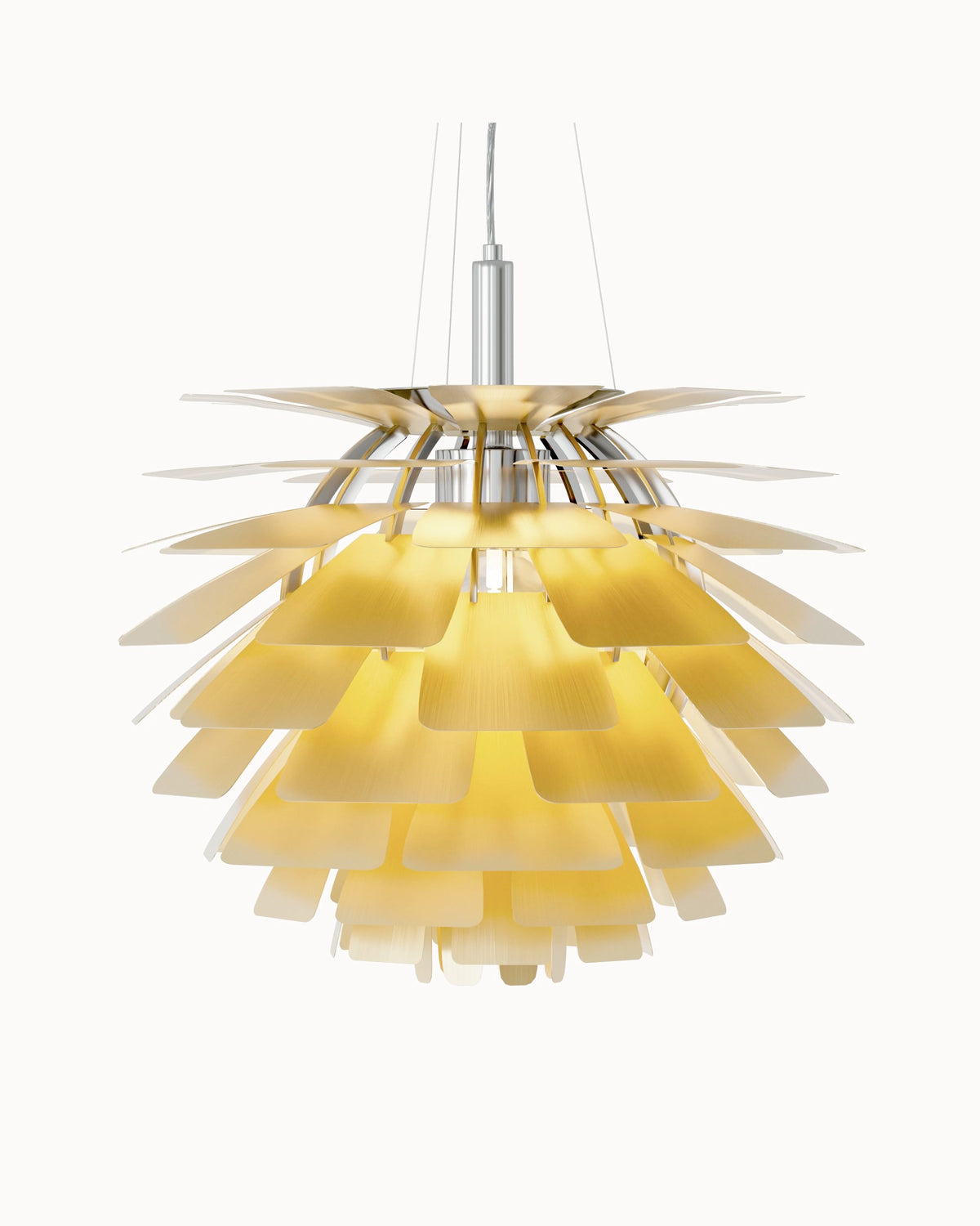 Brass pinecone pendant light with layered metal shades, softly glowing against a clean white background.