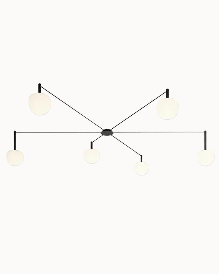 WM1029 six-light frosted glass globe ceiling light with slim black arms arranged in an asymmetrical radial design
