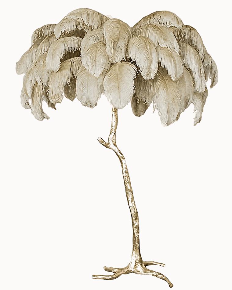 Gold ostrich feather floor lamp with a sculptural branch-style base and large cream feather shade.
