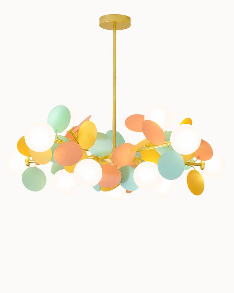 Colorful atomic chandelier with glowing white globe lights, pastel discs, and branching gold arms displayed on a clean white background.