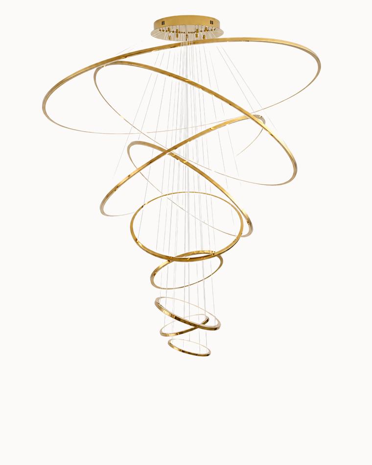 Golden WM2160 entryway chandelier with cascading LED rings, creating a weightless sculptural centerpiece for expansive two-story spaces.