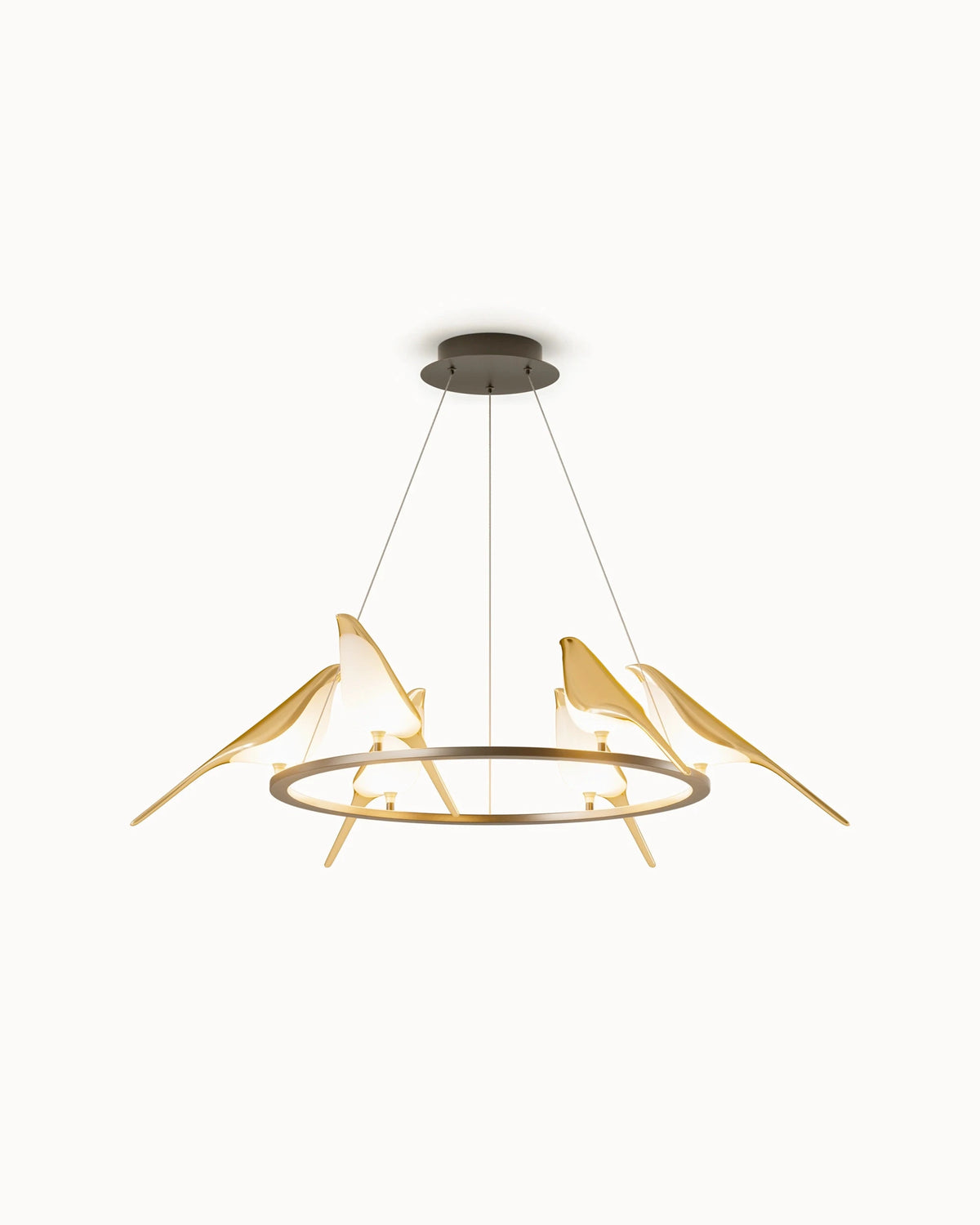 Angled view of the gold bird ceiling light, showing illuminated acrylic bird bodies, long gold tails, suspension cables, and the round canopy.