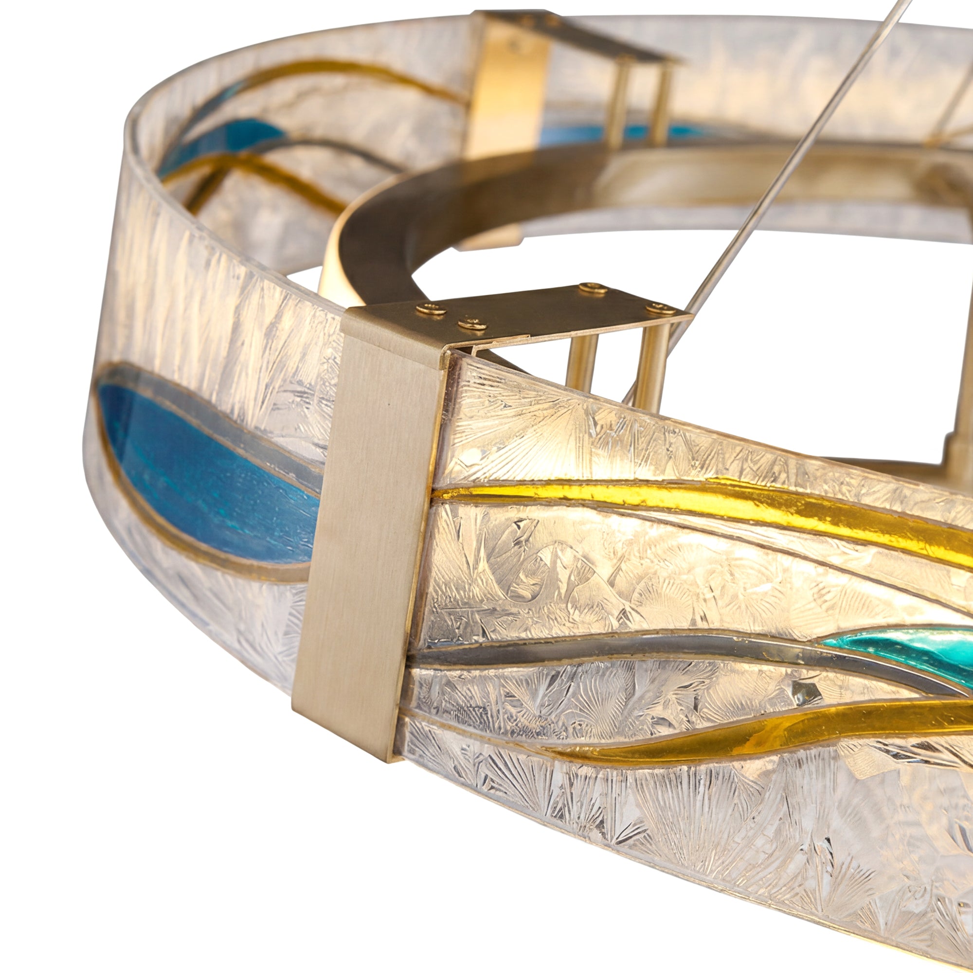 Close-up of the chandelier’s textured glass shade, brushed brass frame, and blue-turquoise enamel wave detailing.