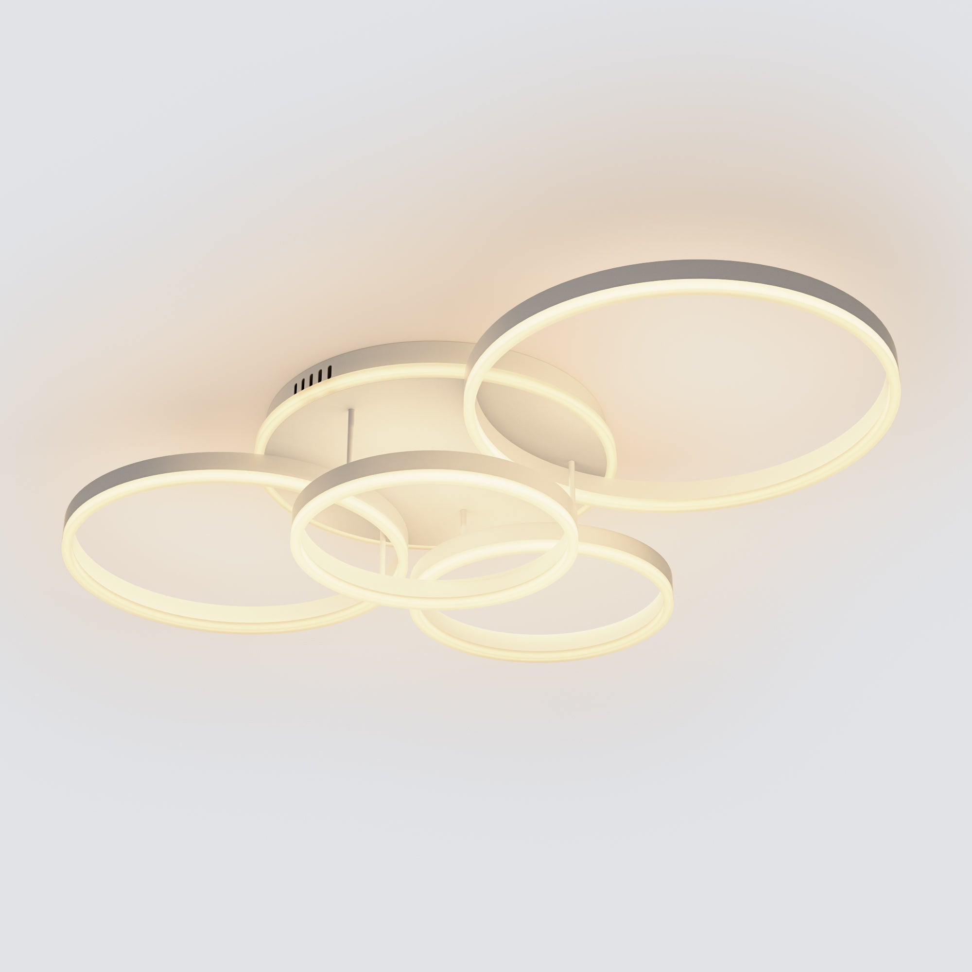 A white five-ring modern ceiling lights design with soft integrated LED glow, creating an airy and refined look for contemporary rooms.