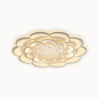 WOMO WM1078 flower flush mount ceiling light with layered illuminated petal rings and cascading faceted crystal drops on a white background.
