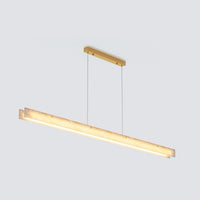 Extended product view of the long rectangular chandelier with glowing alabaster panels and a slim gold ceiling canopy.