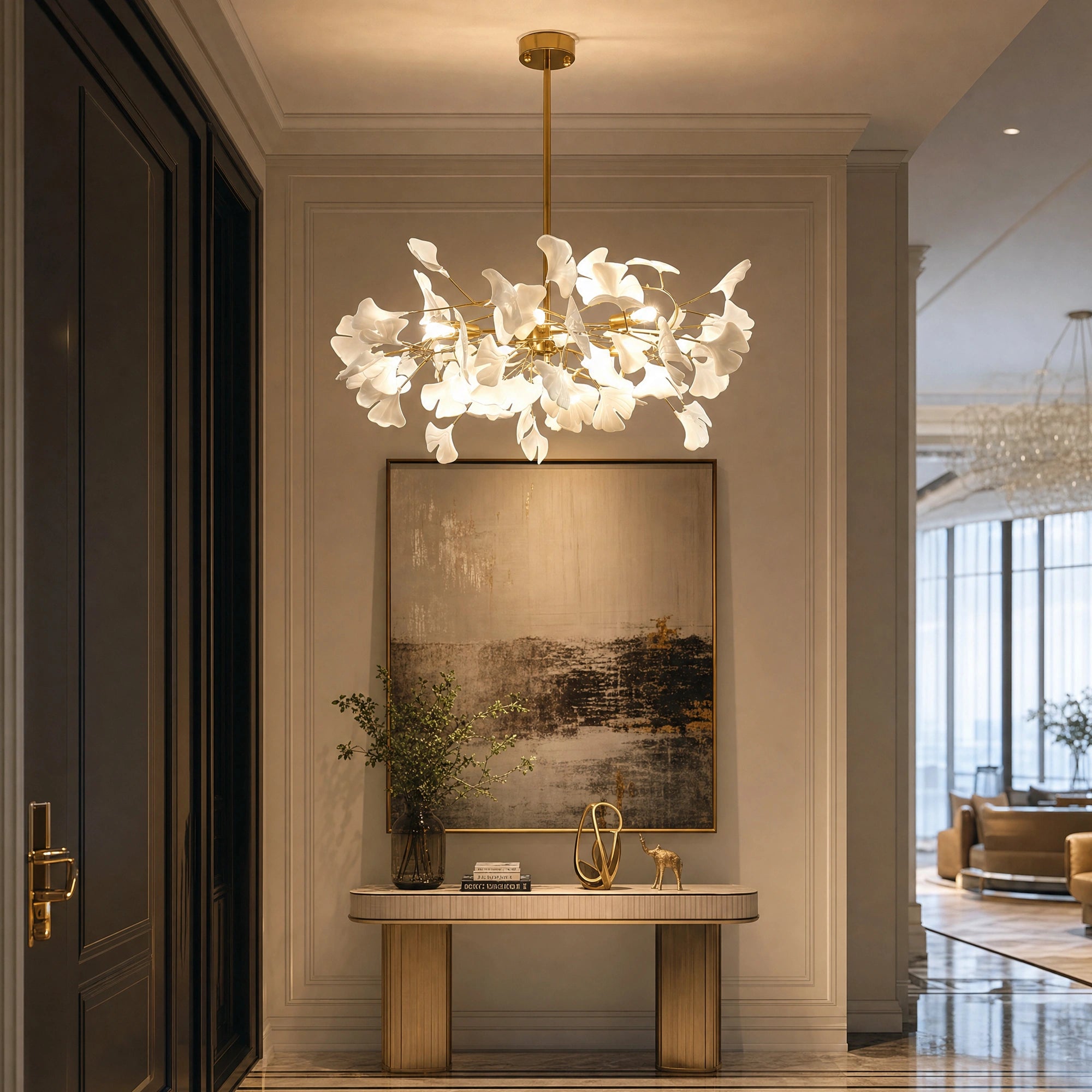 Sculptural ginkgo leaf chandelier for foyer displayed above an entryway console table
