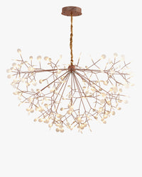 WOMO WM2439 rose-gold Heracleum branch chandelier, forming an expansive canopy of warm firefly-like leaves with an airy, sculptural presence.