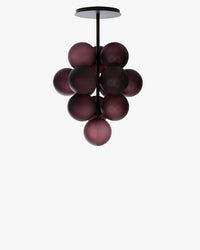 Purple grape chandelier with clustered ribbed glass globes suspended from a black ceiling mount.