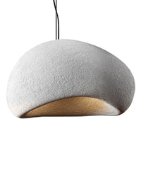 Studio cutout showing one of the white asymmetric resin pendant light fixtures with a softly curved opening.