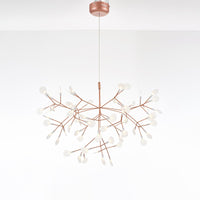 Wide 63-light rose-gold Firefly organic chandelier, creating an abundant swarm of glowing leaves for spacious statement interiors.