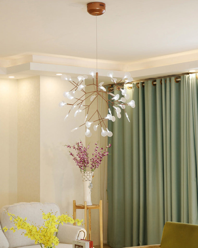 Airy Firefly living room chandelier complementing pale furnishings and green curtains with a graceful, naturally branching silhouette.