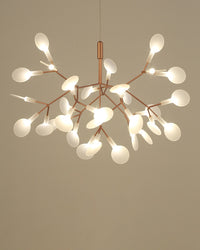 Compact rose-gold Firefly organic chandelier, bringing delicate movement and character to rooms that cannot accommodate an oversized fixture.