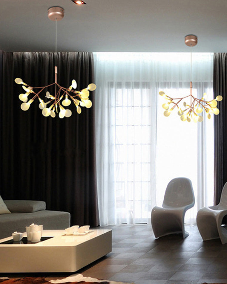 Two rose-gold Heracleum chandeliers show how nature inspiration and firefly-like light can connect adjoining living areas with a graceful rhythm.