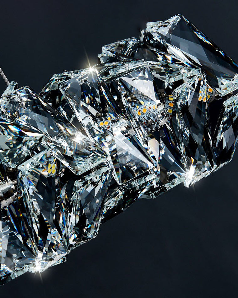 Close-up of faceted crystal pieces and the included LED strip inside the WM2193 LED crystal pendant light.
