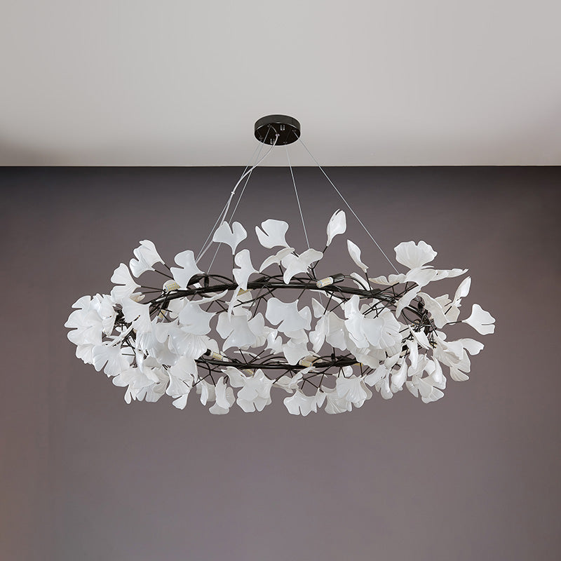 Black 49-inch large round ceramic leaf chandelier shown unlit.