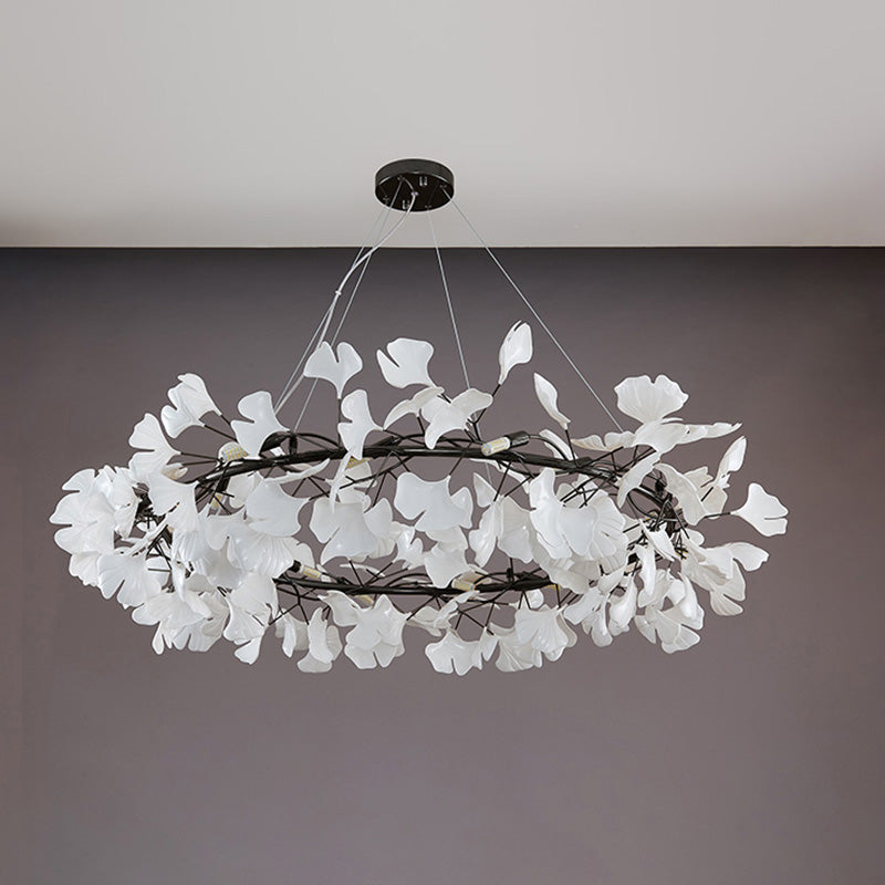 Black 59-inch extra-large round ceramic leaf chandelier shown unlit.