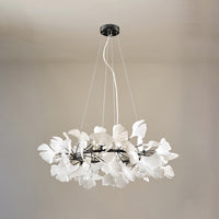 Black 24-inch round ceramic leaf chandelier shown unlit.