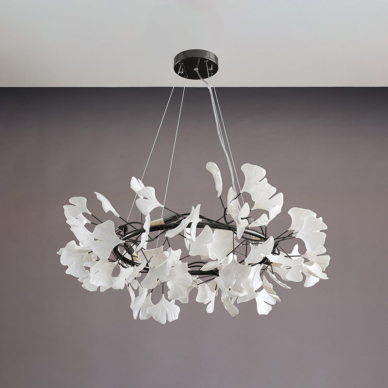 Black 31-inch round ceramic leaf chandelier shown unlit.