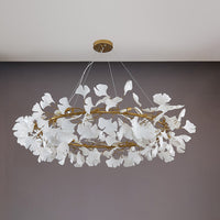 Gold 59-inch extra-large round ceramic leaf chandelier shown unlit.