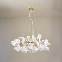 Gold 24-inch round ceramic leaf chandelier shown unlit.