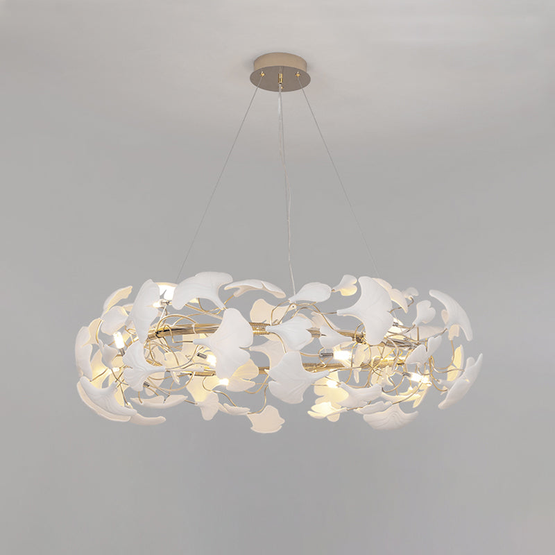 Ø39-inch WM2419 ginkgo leaf chandelier against a light background, emphasizing the larger round canopy of layered white ceramic leaves.