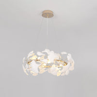 Ø22-inch WM2419 ceramic leaf chandelier against a light background, showing its compact round profile and layered white leaves.