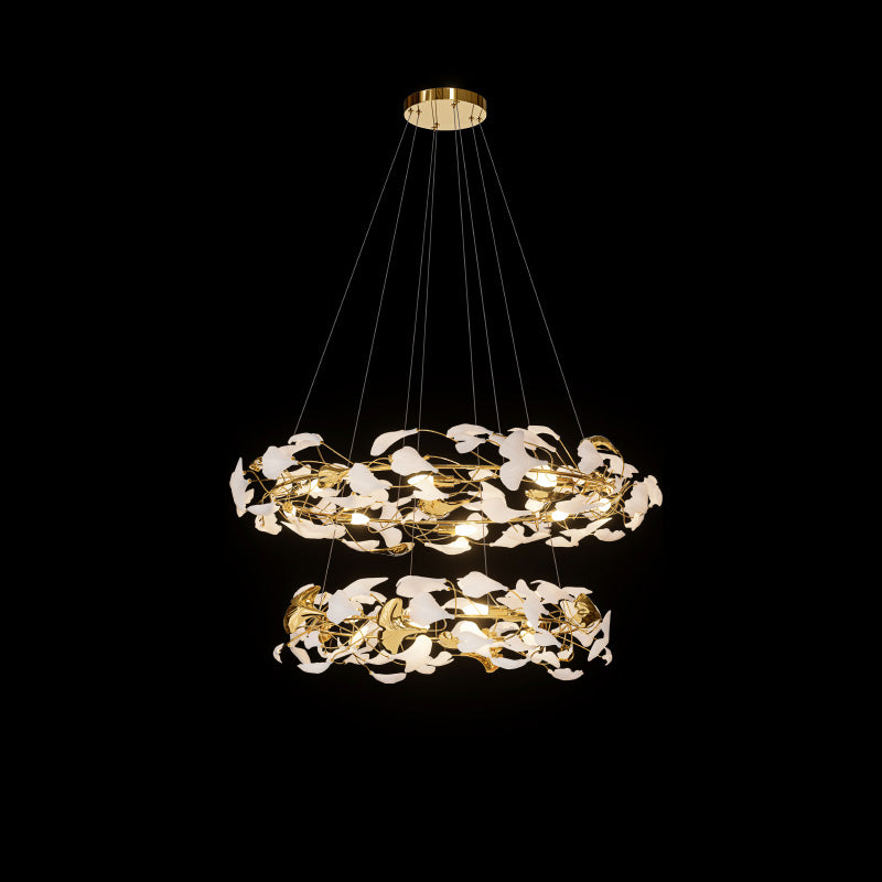 Two-tier ginkgo chandelier with 31.5- and 39.4-inch rings of white and reflective gold leaves.