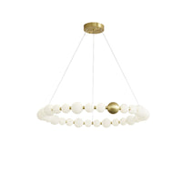 Large 41-inch pearl-ring chandelier stretches its luminous necklace form across the ceiling, creating an elegant focal point for a spacious interior.