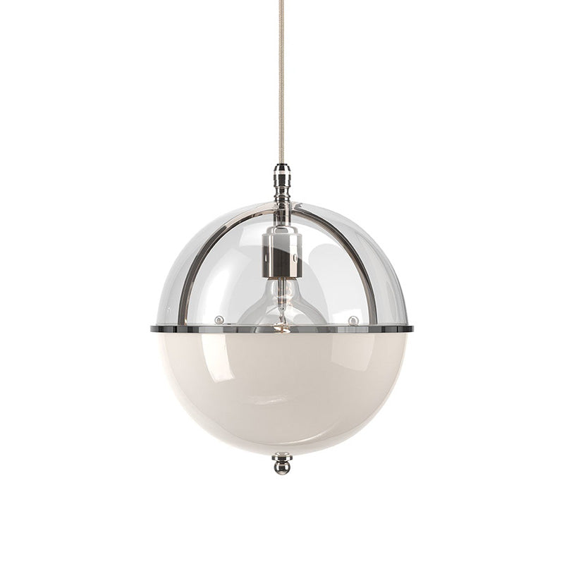 Clear-and-white glass globe pendant light with a transparent upper shade, white lower shade, visible bulb, and metal ring frame.