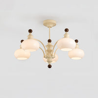 Five-light beige dome glass chandelier on a light background