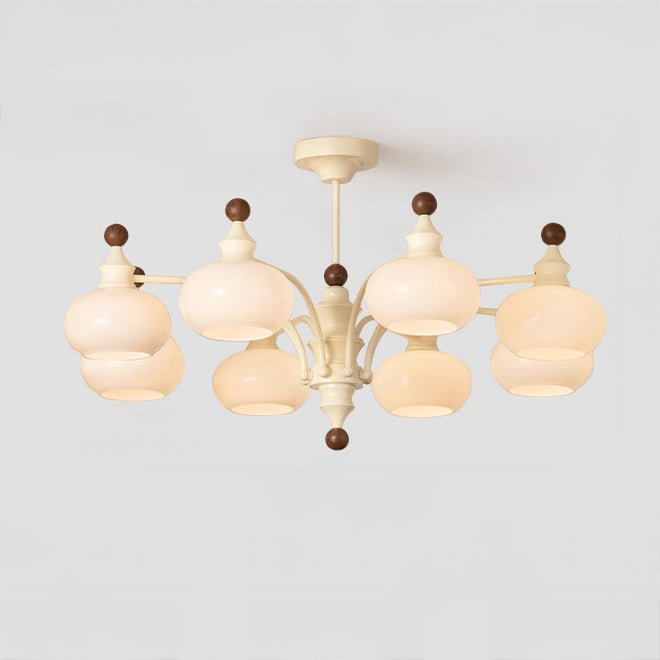 Eight-light beige dome glass chandelier on a light background
