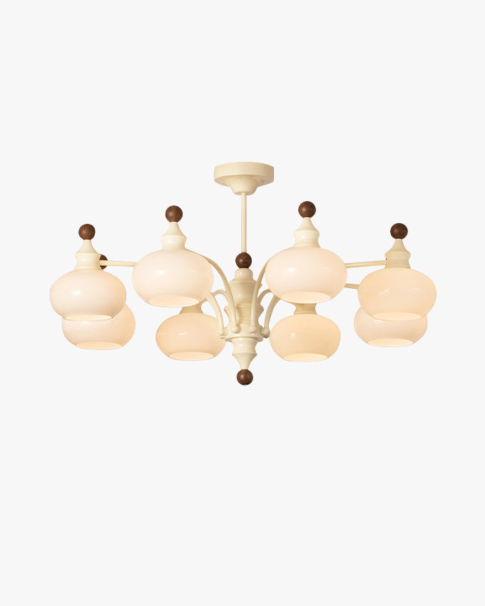 WOMO dome glass chandelier in beige with eight layered glass globes on a light background