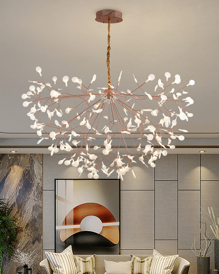 Illuminated Firefly chandelier spreading above modern artwork, becoming the focal point in interior design without overwhelming the furnishings below.