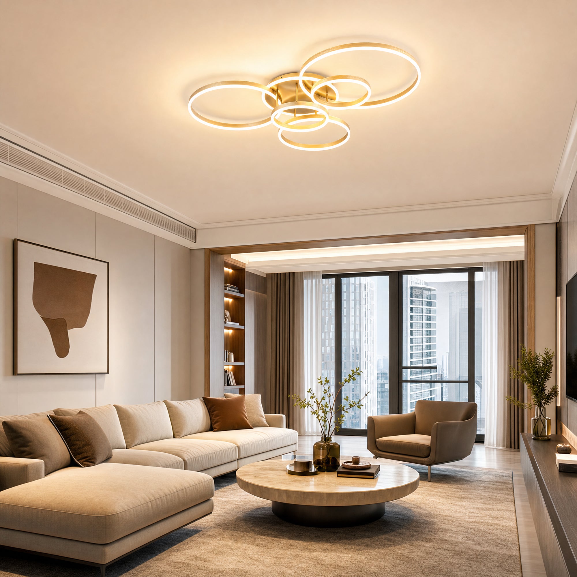 Gold circular living room light fixtures installed above a cozy sofa area, adding soft LED warmth and a polished modern glow to the living space.