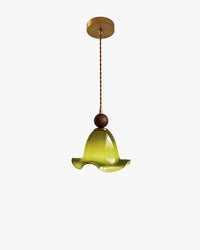 Olive green pendant light with a sculptural ruffled glass bell, dark brown spherical accent, twisted cord and warm gold-toned canopy.