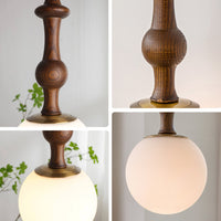 Detail of the walnut-look wood-grain stem on the walnut pendant light