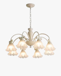 Eight-light flower chandelier with scalloped frosted glass bell shades, a cream-white metal frame, and chain suspension.