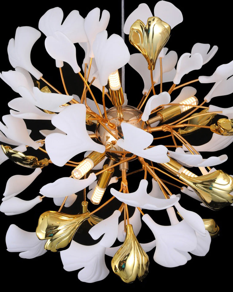 Close-up overhead shot of the white and gold ginkgo leaf chandelier, showing its gold-finish central hub, white ginkgo leaf panels, and integrated LED bulbs.