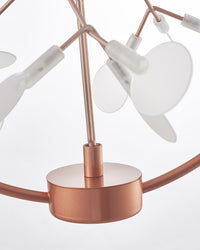 Close-up of the rose-gold lower housing and branching connections, highlighting the refined metal finish and clean construction of the branch chandelier.