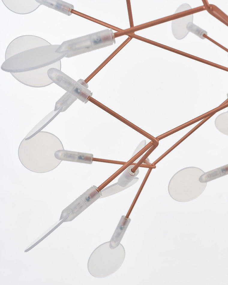 Fine rose-gold branches and delicate glowing leaves express light elegance, giving the large chandelier visual richness without crystal heaviness.