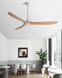 Flowing light-wood blades give this wooden ceiling fan a calm, natural presence above a sunlit contemporary dining room.