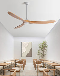A white mount and softly curved wood blades help this minimalist ceiling fan settle naturally into the quiet neutral lounge.