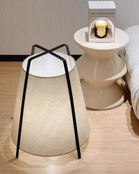 Top view of the short lantern lamp showing the crossed black metal handles above the shade.