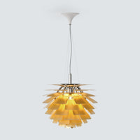 Gold pinecone pendant light with layered metal shades and a slim hanging cord on a light gray background.