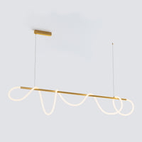 Long polished-brass linear chandelier with multiple illuminated silicone loops extending across a wide horizontal bar.