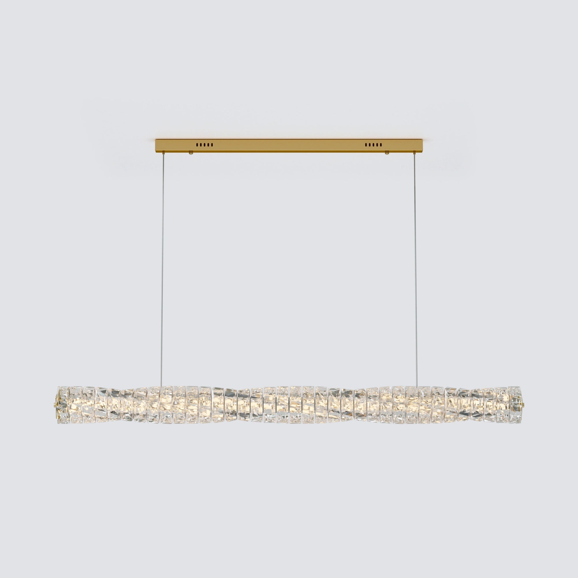Gold linear pendant lighting fixture with a faceted crystal bar, two suspension cables and a matching rectangular canopy.