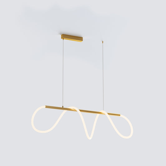 Compact polished-brass brass linear chandelier with sculptural illuminated loop and two suspension cables on a pale gray background.