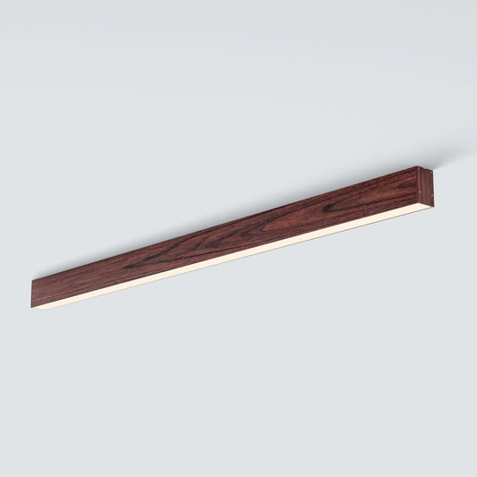 A modern linear ceiling light fixture with a dark brown wood grain finish and a warm white LED light strip, shown against a light gray background.