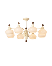 Beige eight-light dome glass chandelier with layered globe shades, isolated